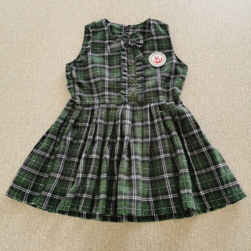 girls green plaid sleeveless school dress front view
