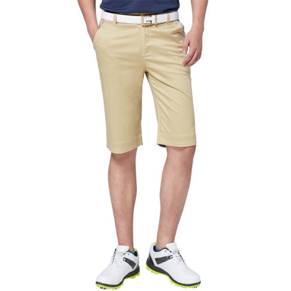 Water droplets beading on the surface of Element-Shield golf shorts.